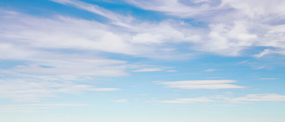 Wall Mural - vast blue sky with wispy cloud trails, dreamy atmosphere
