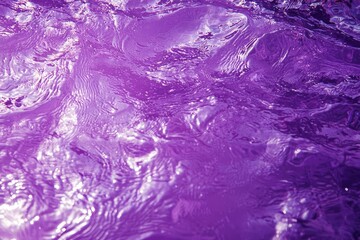 Wall Mural - violet colored clear water. crystal clear ocean water surface on a tropical exotic beach.