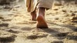 © vetrana - Footsteps in the sand  a man s journey following jesus on a spiritual path of faith