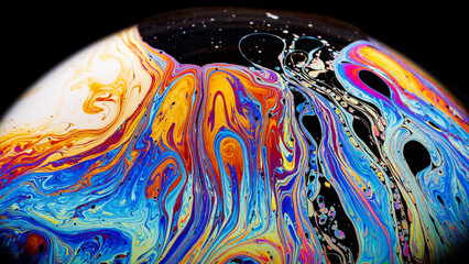 Wall Mural - Closeup on a colorful soap bubble to demonstrate thin film interference physics concept with shapes and colors always in motion