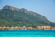 Golfo Aranci beach view from the other side of the bay with turquoise water in Sardinia, Italy