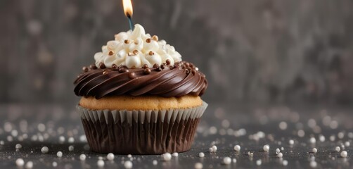 Wall Mural - Birthday cupcake with edible pearls and chocolate icing, dessert, party