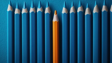 Aufkleber - A single orange pencil standing out among a set of identical blue pencils