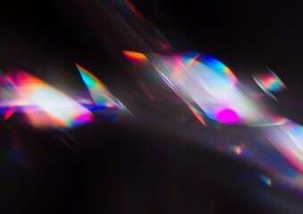 Wall Mural - abstract iridescent light streaks on black background. vibrant rainbow colors.