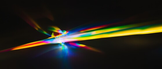Wall Mural - vibrant streaks of light explode across a dark background, creating a dynamic and colorful abstract 