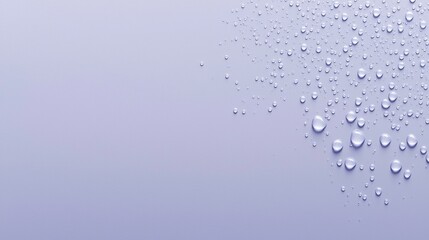 Poster - Numerous water droplets of varying sizes rest on a smooth, lavender surface, creating a visually appealing textural pattern with ample negative space for text or design elements