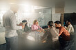 © Zamrznuti tonovi - Diverse team collaborating on project in modern office meeting room