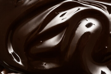 Canvas Print - Dark melted chocolate as background