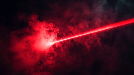 Fototapete - A vibrant red laser beam cutting through a dark, smoky background, creating a dynamic visual effect.