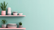 © Phirakhup - Open shelving with dishes and plants against mint wall