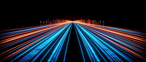 Canvas Print - Futuristic highway with glowing blue and orange lines at night.