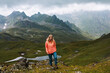 © EVERST - Woman traveler hiking in mountains, girl traveling solo walking outdoor adventure active healthy lifestyle vacations trip weekend getaway eco tourism