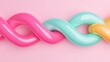 © Tackey - Colorful Twisted Rope on Soft Pink Background with Glossy Finish and Smooth Texture