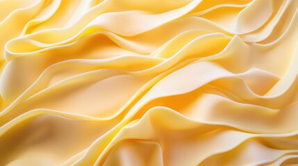 Poster - Silky yellow fabric folds creating a luxurious texture background for fashion or interior design themes