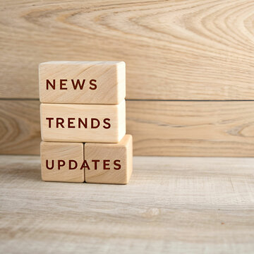 text trending on wooden cubes on a wooden backgro