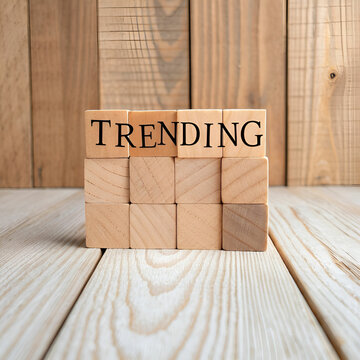 text trending on wooden cubes on a wooden backgro