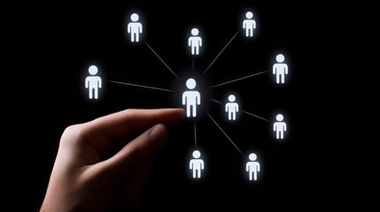 Fototapete - A hand touching icons of people in a network on a black background, representing the human resources concept.