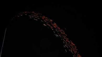 Poster - Unique display of sparks illuminating the night sky at a local festival in the city