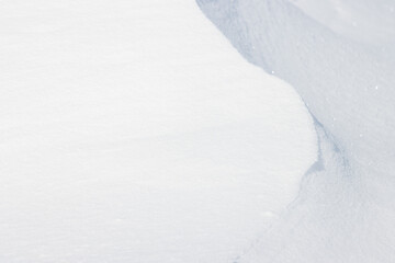 Wall Mural - white windswept snow ridge texture background