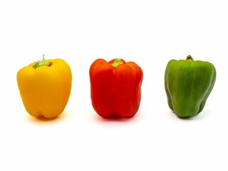 Colorful bell peppers on white background.