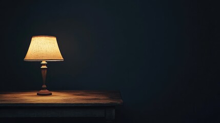 Poster - Warm glow of vintage lamp on a rustic farmhouse table creating cozy ambiance against a dark wall backdrop.