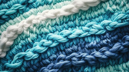 Aufkleber - Textured knitted fabric in shades of sky blue, water green, and white, showcasing intricate braiding patterns on a vibrant background.