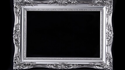 Poster - Elegant ornate silver picture frame isolated on black background for artwork display or decoration with clipping path included