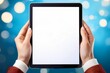 © Poetra RH - hands holding digital tablet with a white blank screen