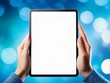 © Poetra RH - hands holding digital tablet with a white blank screen