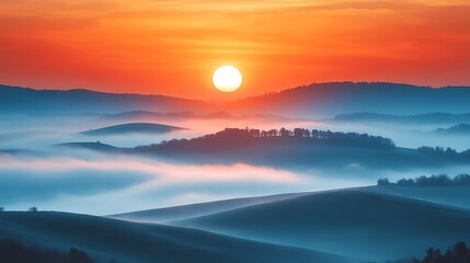 Wall Mural - Sunrise over Misty Mountains: A breathtaking panorama of rolling hills and valleys shrouded in a mystical morning fog, with a vibrant sunrise painting the sky in fiery oranges and reds.