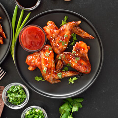 Poster - Baked chicken wings on plate