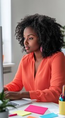 Aufkleber - Woman focused on computer work in a bright and minimalistic workspace with colorful office supplies