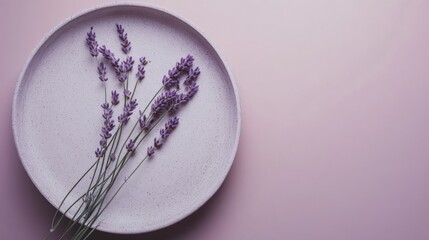 Poster - Lavender flowers arranged elegantly on a minimalist plate in soft lavender tones at midday