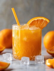 Poster - Freshly squeezed orange juice served in a glass with ice and garnished with a slice of orange on a bright surface surrounded by oranges