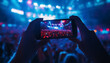 © goami - person making photo with phone at music festival event at night