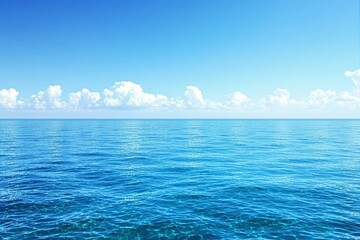 Aufkleber - Stunning blue ocean under a clear sky with fluffy white clouds in the distance, creating a serene and peaceful atmosphere.