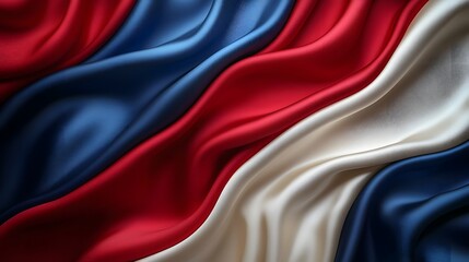 Leinwandbilder - Fluid and graceful abstract background with smooth silk textures in red white and blue creating a beautiful patriotic flag inspired design with a modern and elegant aesthetic