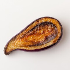 Poster - Perfectly roasted eggplant slice with golden edges on a clean surface showcasing culinary delight