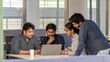 © Jo - Indian Entrepreneur Team – A group of Indian entrepreneurs brainstorming in a modern office space.