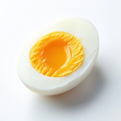 Poster - Boiled egg cut in half revealing bright yolk and smooth white on a clean surface