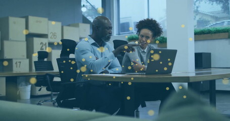 Poster - Image of glowing yellow spots over diverse business people in office