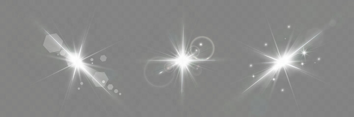 Poster - Set of glowing light effects with lens flares, starbursts, and radiant beams on a transparent background. Bright, luminous elements suitable for overlays and decoration.	