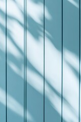 Poster - This abstract background features vertical grooves in soft light blue tones, enhanced by subtle shadows