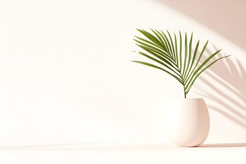 Poster - green palm leaf in a modern white vase casting a soft shadow on a minimalist beige background, creat