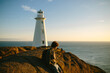 © ADDICTIVE STOCK - Anonymous man enjoys sunset near Cape Spear Lighthouse, Newfoundland