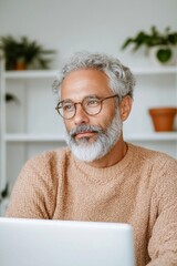 Poster - Contemporary Home Office Aesthetic Middle-Aged South Asian Man in Knit Sweater with Modern Shelves and Greenery - Digital Marketing and Virtual Meeting Innovation