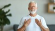 © Yuparet - Senior Man Practicing Deep Breathing Exercise for Fitness and Relaxation at Home