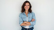 © Melissa - Woman with brown hair with arms crossed and a friendly smile on her face