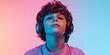 © VALUEINVESTOR - A young boy wearing headphones, generative AI