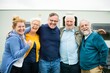 © Rawpixel.com - Group of five smiling older adults standing together outdoors, showing friendship and joy. Old people asually dressed and appear happy and relaxed. Happy senior people.
